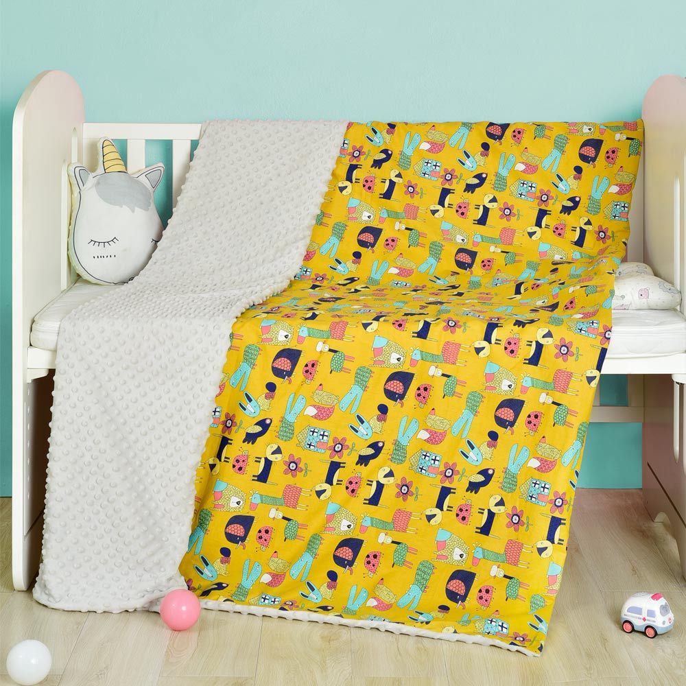 Zweiseitige Babydecke aus Baumwolle – kindgerechte Motive & unifarbene Rückseite