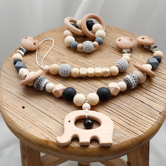 Handgemachtes Babyschnullerkettenset aus Holz